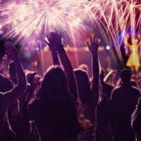 New,Year,Concept,-,Cheering,Crowd,And,Fireworks